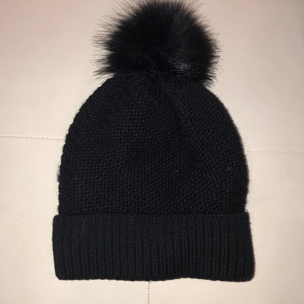 Black knit hat with Pom Pom top